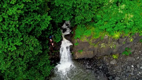 Hiking a waterfall Stock Footage 241703651