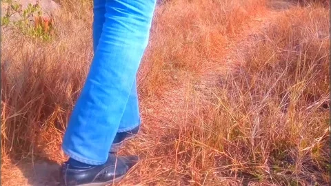 Hiking while Swinging Bottle of water Stock Footage 136989205
