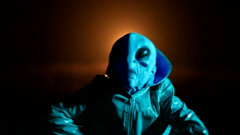Hilarious alien dancing on dark backdrop. Funny meme footage of arrived on Stock Footage 199669814