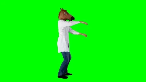 Hilarious Disco Doctor Dancing in Lab Coat and Horse Head Mask on Green Screen Stock Footage 83091987