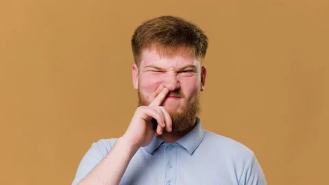 A hilarious studio shot of a young redhead guy Stock Footage 234690125