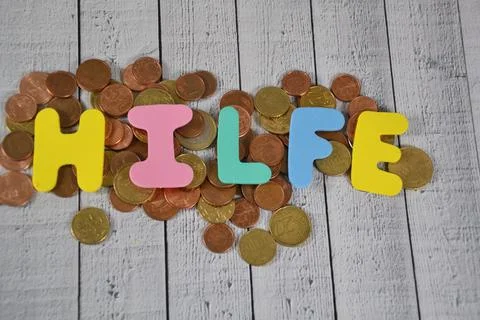 Hilfe- the german word for help Stock Photos