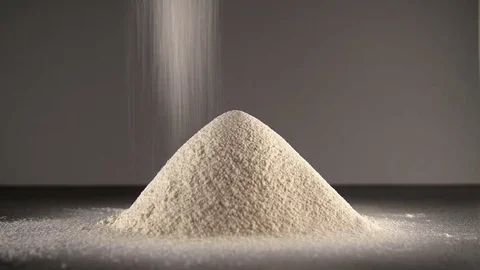 The hill of flour on a grey background on black table Stock Footage 84602338
