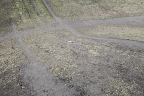 A hill with grass in poor condition Stock Photos
