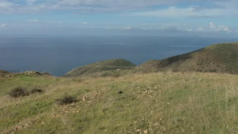 A hill by the ocean 2 Stock Footage 127582189