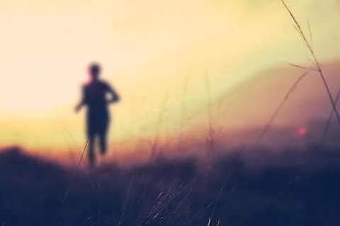 Hill Runner At Sunset Stock Photos