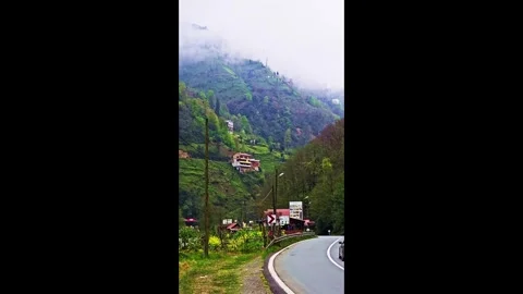 A hill with a small house on top Stock Footage 272787290