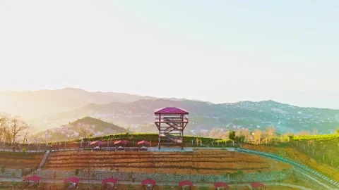 A hill with a small tower on top Stock Footage 273011469