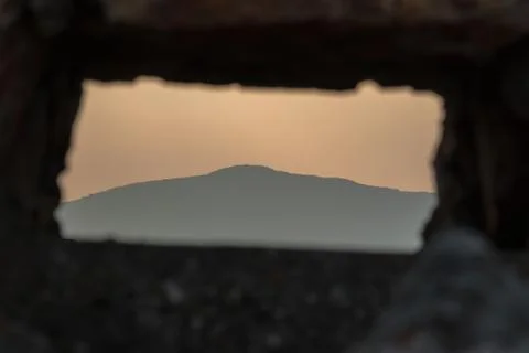 Hill through the hole. Stock Photos