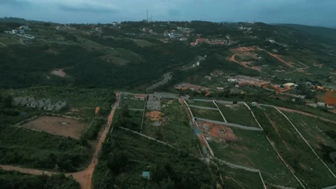 Hill-top construction architectural drone shot Stock Footage 219584710