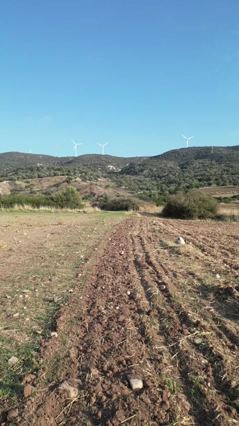 Hill by the wind farm Video stock 319626331