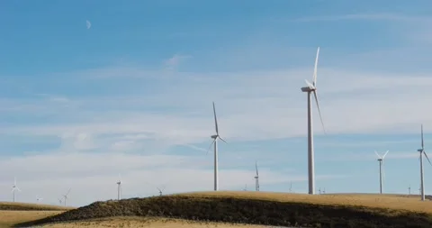 Hill of Windmills with Moon - Handheld Video stock 237417362