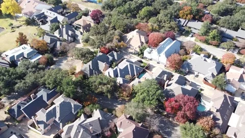 Hillcrest Road curves through affluent residential grid near Forest Lane Stock Footage 327538426