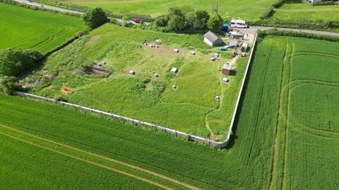 Hillhead, South Devon, England: DRONE VIEWS: Reservoir spreading cryptospiridium Stock Footage 276097360