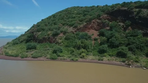 A hillock on the side of a lake Stock Footage 109526849