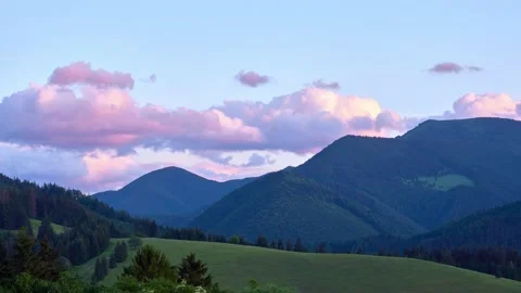 Hills and forests with moving clouds over the Carpathians in summer, time lapse 動画素材 198229395