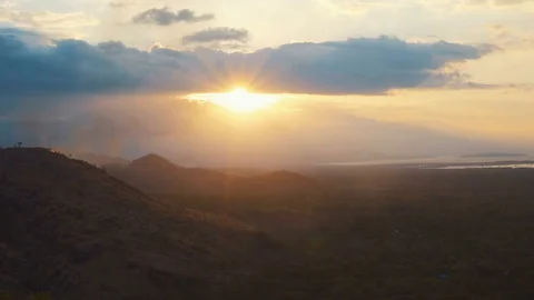 Hills landscape on sunset, small fire on hill Video stock 81654862
