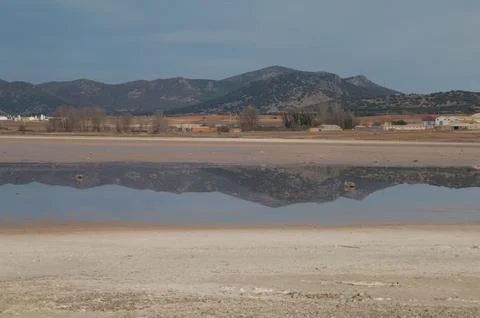 Hills reflected in a lagoon. Foto stock