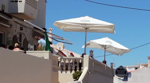 A hillside bar overlooking the by and Atlantic Ocean Stock Footage 65336139