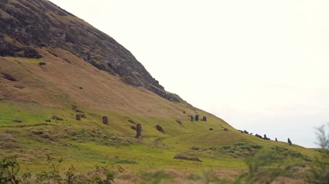 Hillside on the Easter Island, with Moai statues all over Stock Footage 64258403
