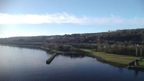 Hillside Harbor Jetty and Riverside Homes Stock Footage 271019028