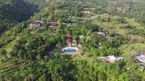 Hillside hotel pull in Stock Footage 329896429