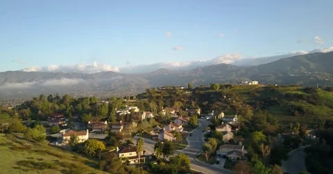 Hillside panning with mountain background Stock Footage 77702579