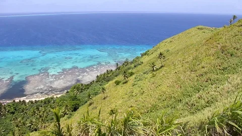 Hillside View of the Crystal Blue and Green Waters of Dravuni Island, Fiji Stock-Footage 123094262