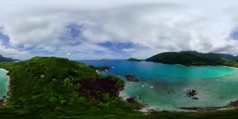 Hillside villas overlooking a turquoise bay. Mahe, Seychelles. Stock Footage 301446646