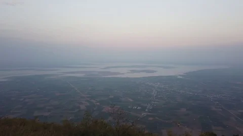 Hilltop view at sunset with fog Stock Footage