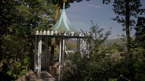 Hilltop viewing point with a man in the shadows Stock Footage 128550396