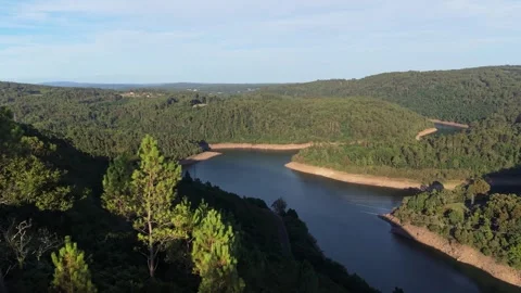Hilly Terrain Covered In Low Shrubs And Trees Surrounds Stock Footage 344946237