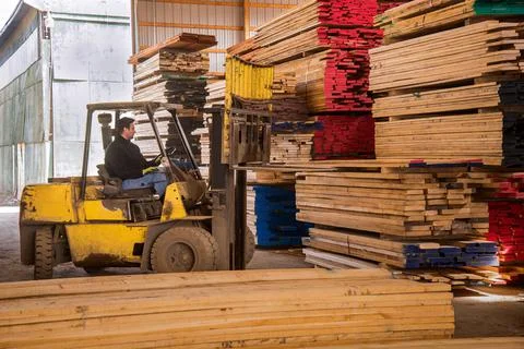 Hilo lifting load of lumber to send to customer by truck Stock Photos