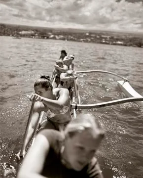 Hilo, women row an Outrigger Canoe in Hilo Bay (B&W) Stock Photos