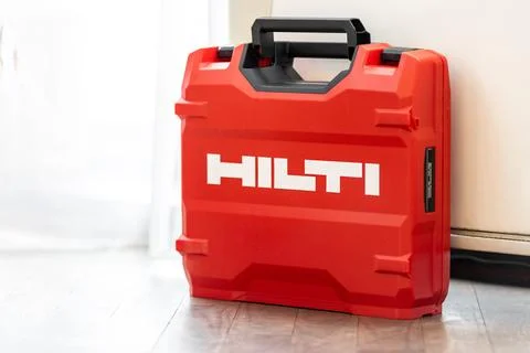Hilti new red tool case on the floor Stock Photos