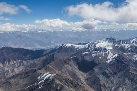 Himalaya mountains under clouds Stock-Fotos