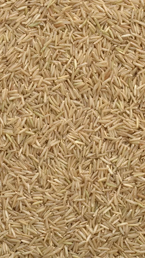 Himalayan brown basmati rice background texture. Vertical video. Stock Footage 303891317