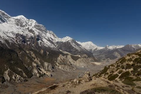 Himalayan mountain range, valley and snowcapped peaks Stock Photos