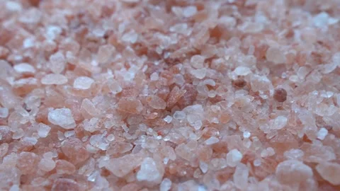 Himalayan pink salt close-up on a white background flat lay. Dry herbs Stock Footage 247820200