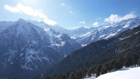 Himalayan winter cold snowfall white mountains frozen pine tree forests in .. Stock Photos