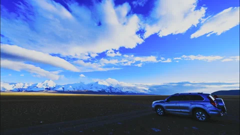 Himalayas Mount Chomolhari Sunset Timelapse with SUV in Tibet Stock Footage 339859918
