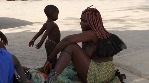 Himba tribe in Opuwo streets, Namibia, Africa in 4K Stock Footage 90885136