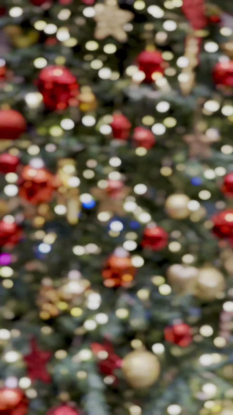 Himmering abstract colored circles defocused christmas lights video. Blurred Stock Footage 314065555