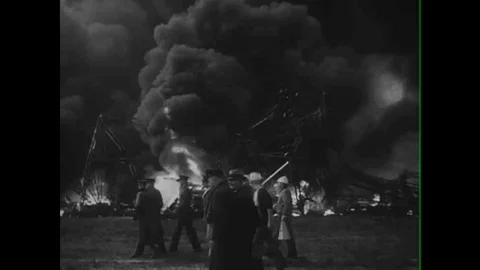 The Hindenburg zeppelin explodes at Lakehurst, N.J. in 1940 Stock Footage 106626897