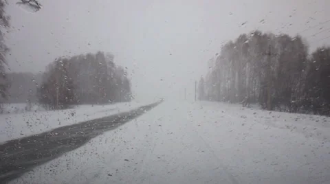 Hindered visibility through the windshield during a blizzard POV Stock-Footage 47421077