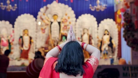 Hindu devotee folding hands at dussehra festival in day Stock Footage 314825682