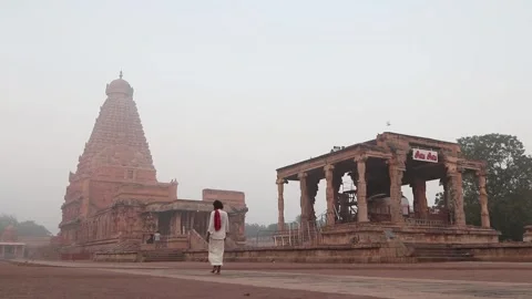 Hindu devotee visiting Brihadishvara Temple, Thanjavur Tamilnadu India Stock Footage 242775316