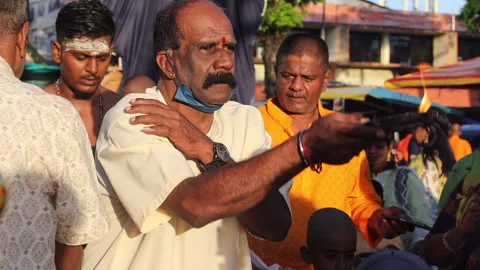 Hindu Devotees Get Blessing From Incense At Silver Pot During Thaipusam Festival Stock Footage 234035927