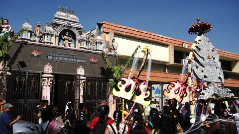Hindu devotees in kavadi dance in front Hindu temple. Stock Footage 141763730