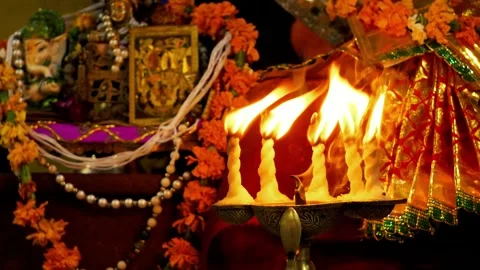 Hindu Devotees Performing Aarti for Multiple Gods Stock Footage 316895063